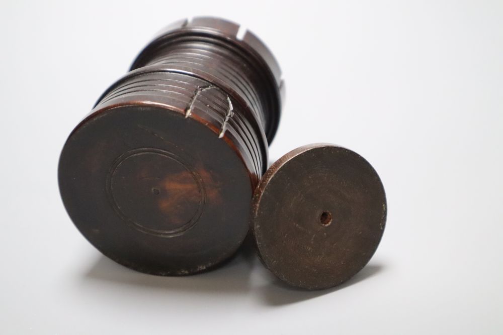 A 19th century lignum vitae turret shaped jar and cover, a similar acorn shaped string box and bowl, and a stained sycamore and engine